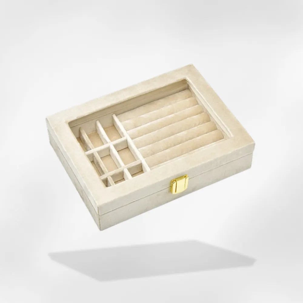 https://cdn.shopify.com/s/files/1/0889/8084/8989/files/Bo_te_bijoux_avec_couvercle_transparent_beige.webp?v=1748691339