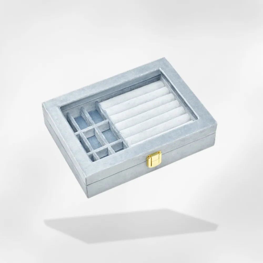 https://cdn.shopify.com/s/files/1/0889/8084/8989/files/Bo_te_bijoux_avec_couvercle_transparent_bleu.webp?v=1748691364