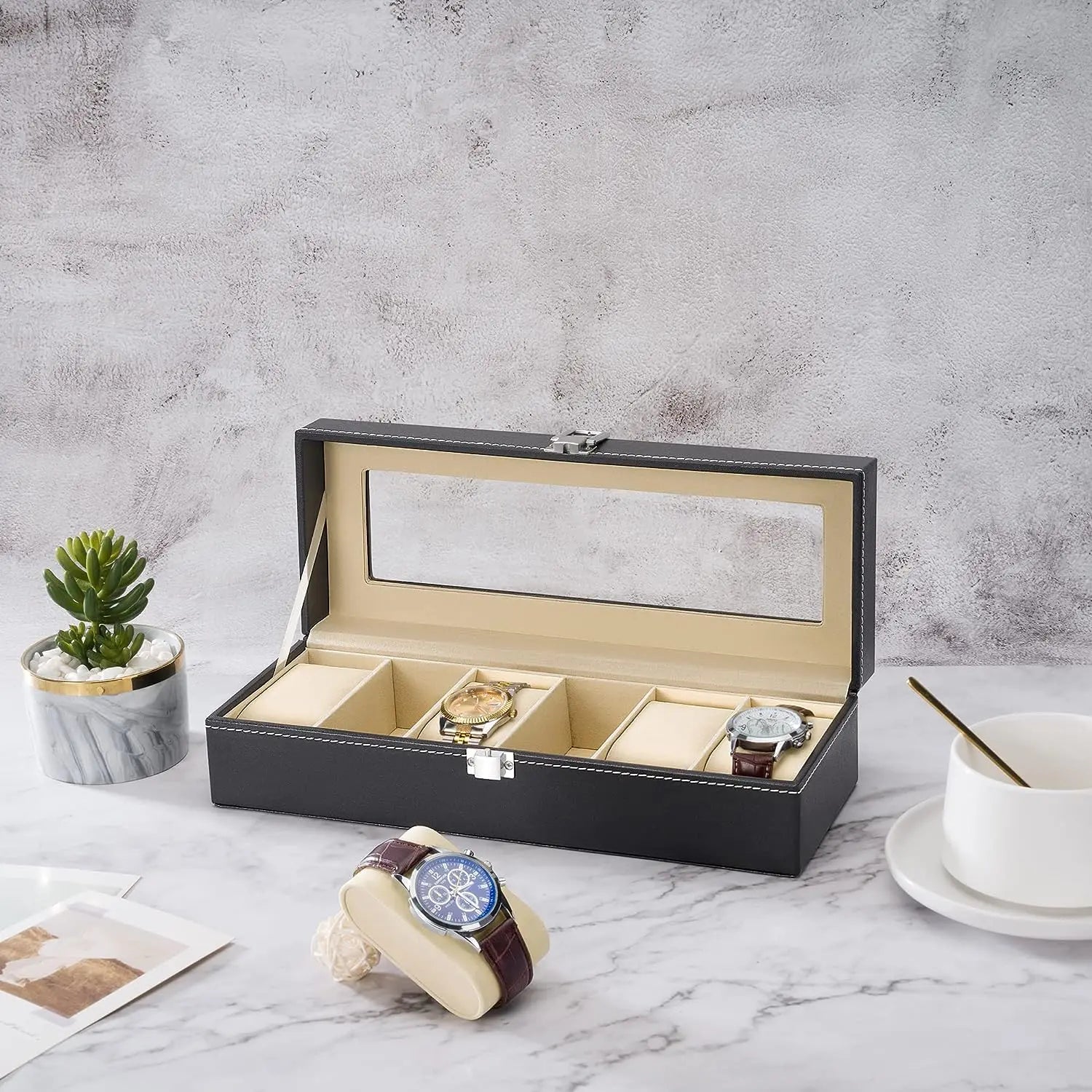 https://cdn.shopify.com/s/files/1/0793/1897/4808/files/boite-6-montres.webp?v=1706196243