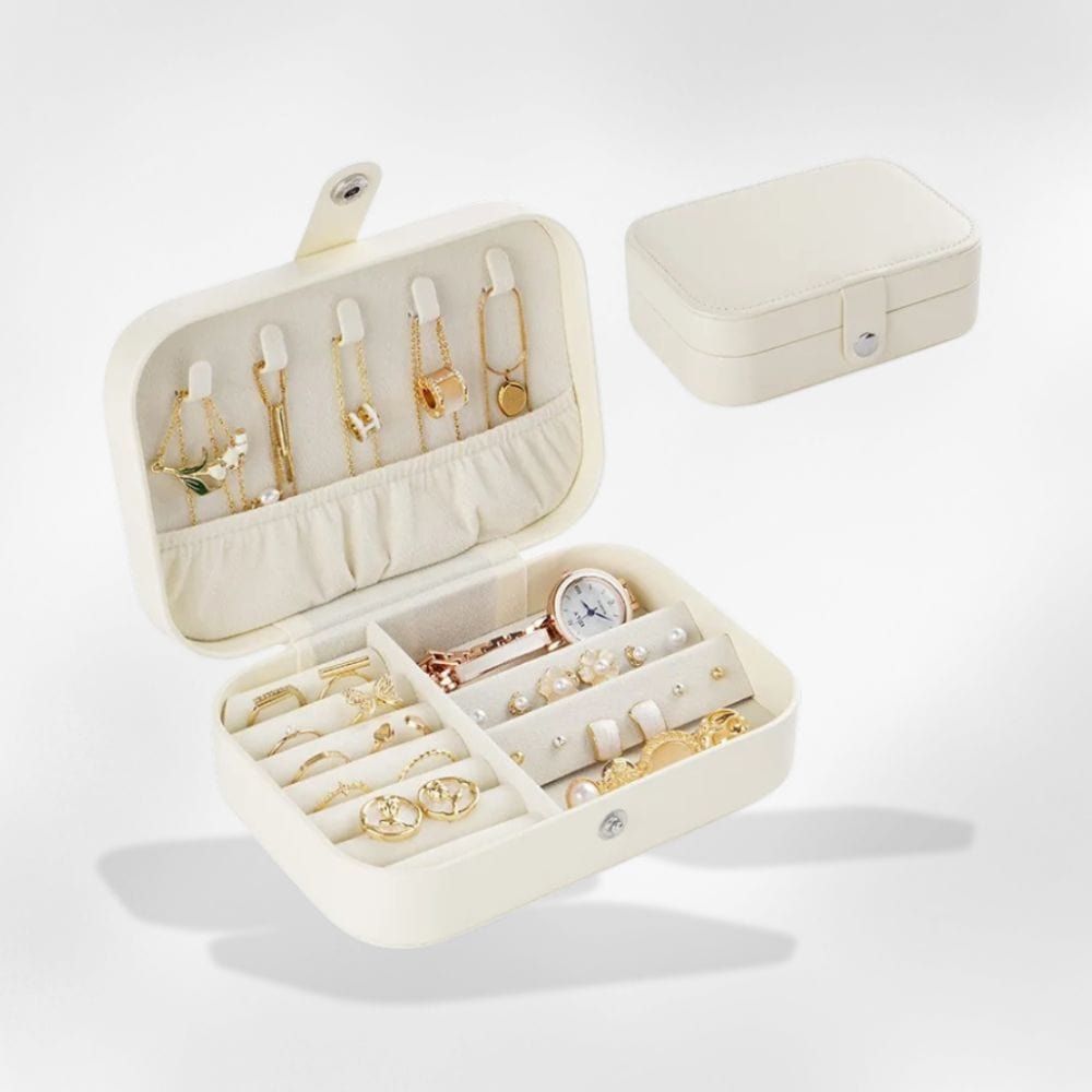 https://cdn.shopify.com/s/files/1/0889/8084/8989/files/royalcoffer-blanc-boite-a-bijoux-br-simili-cuir-71360879067485.jpg?v=1733068686