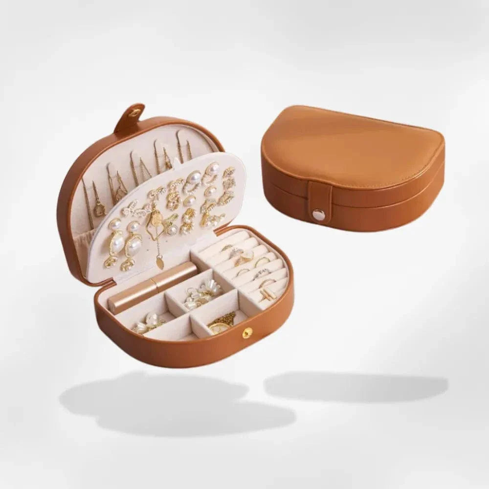 https://cdn.shopify.com/s/files/1/0889/8084/8989/files/royalcoffer-marron-blanc-boite-a-bijoux-tendance-1128180557.webp?v=1739079551