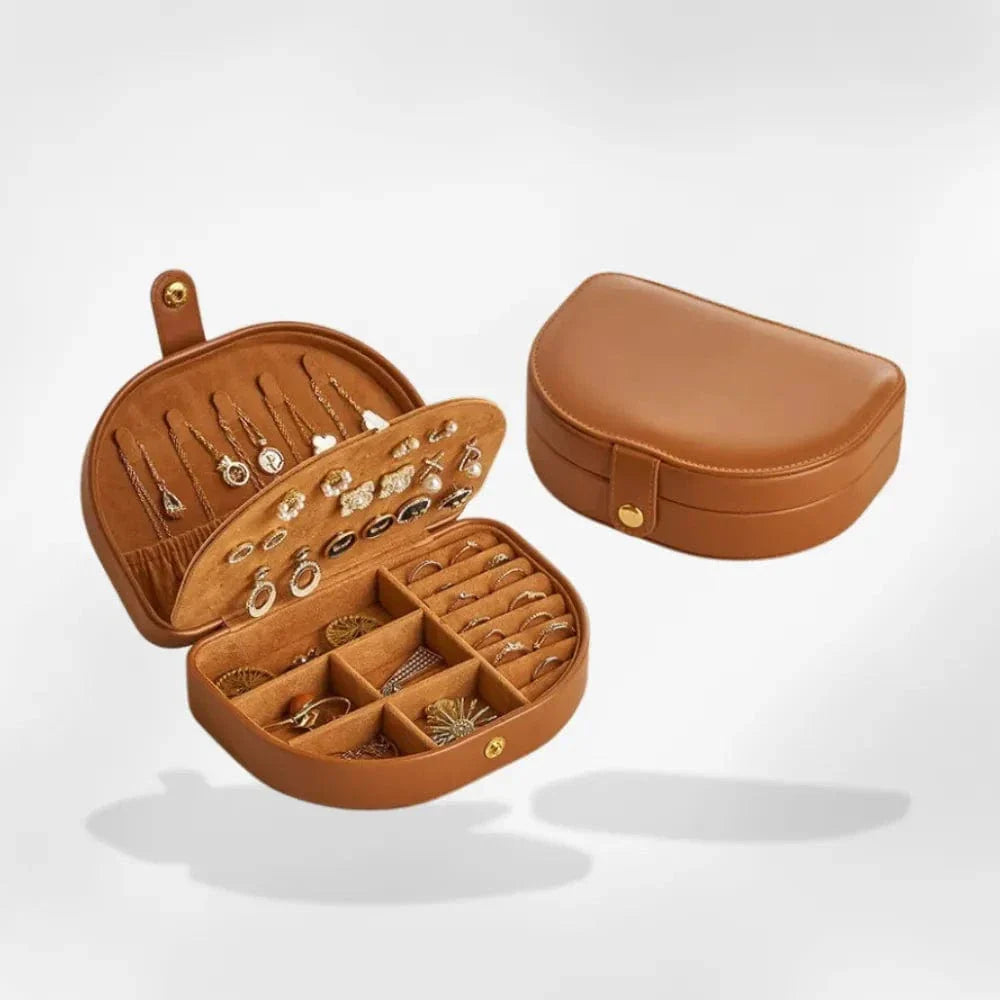 https://cdn.shopify.com/s/files/1/0889/8084/8989/files/royalcoffer-marron-boite-a-bijoux-tendance-1128180556.webp?v=1739079545