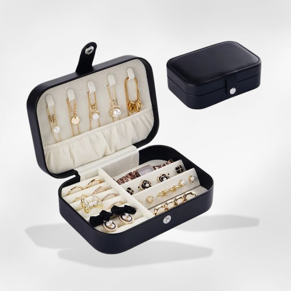 https://cdn.shopify.com/s/files/1/0889/8084/8989/files/royalcoffer-noir-boite-a-bijoux-br-simili-cuir-71360879165789.jpg?v=1733068697
