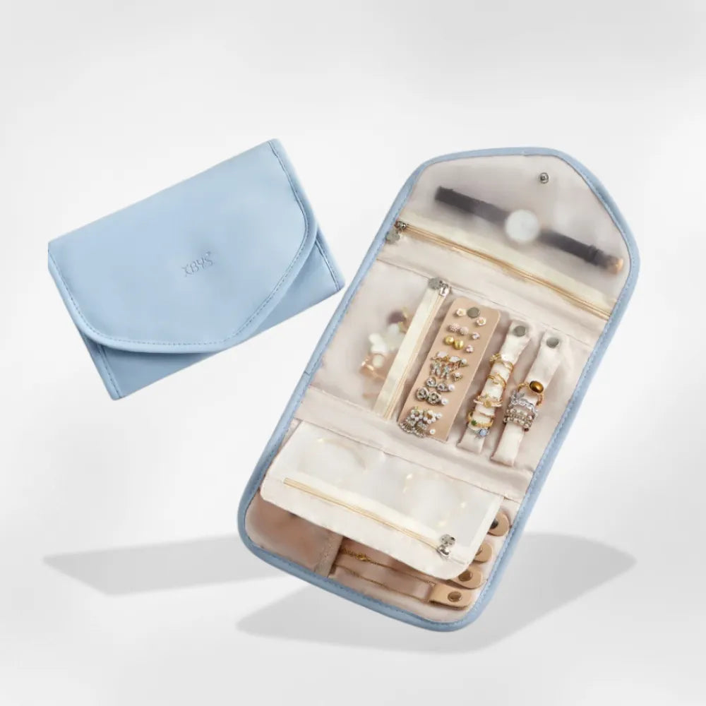 https://cdn.shopify.com/s/files/1/0889/8084/8989/files/royalcoffer_Pochette_Rangement_Bijoux_Voyage9.webp?v=1752238112